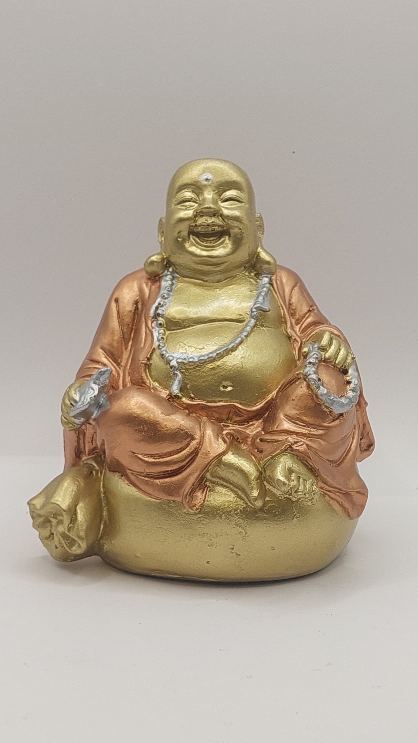 Buda Hotei sobre Costal (dorado/oro rosa)