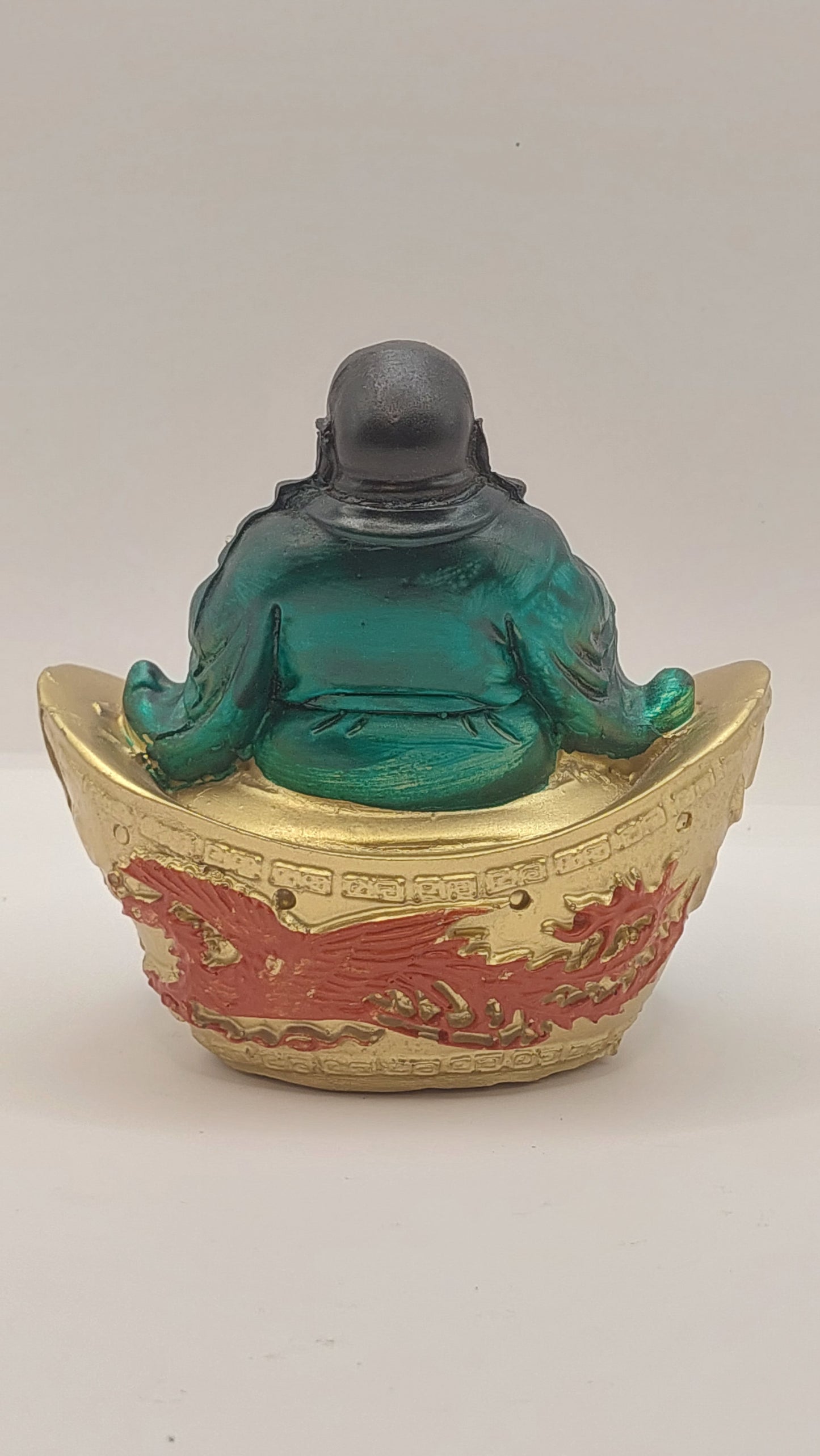 Buda Hotei sobre Lingote