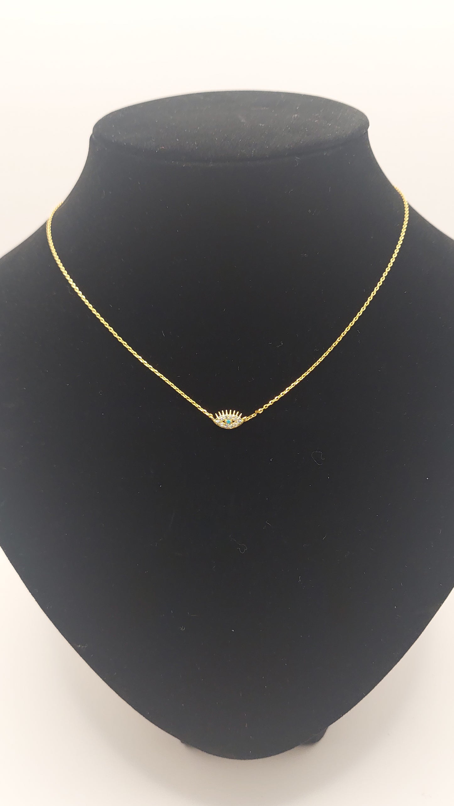 Collar con dije Ojo de Horus Dorado