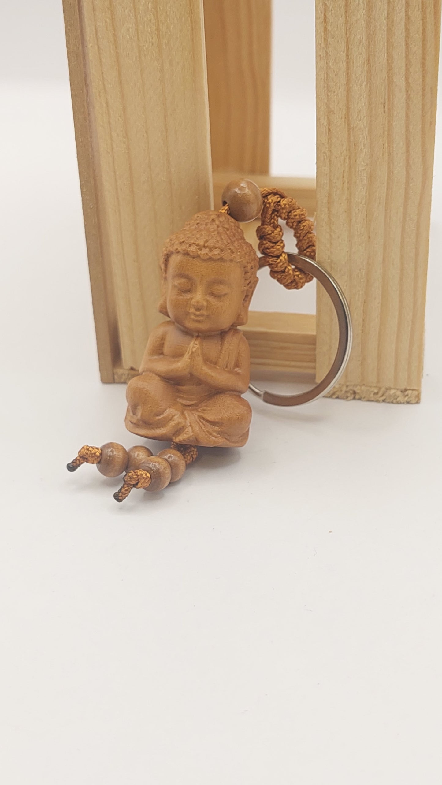 Llavero Baby Buda (manos en pecho)