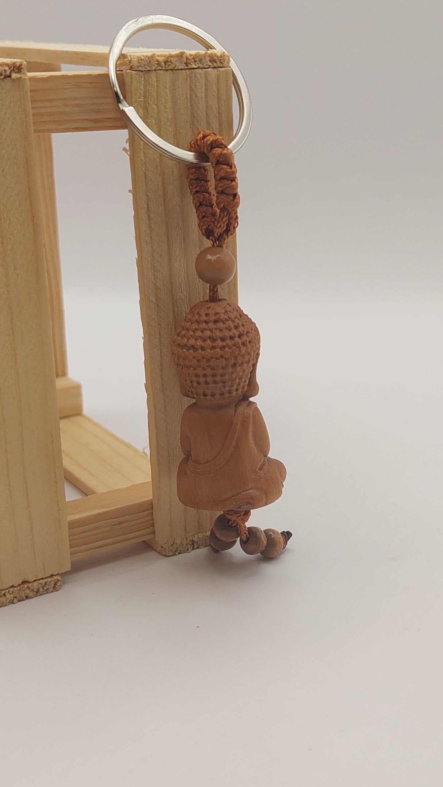 Llavero Baby Buda (manos en regazo)