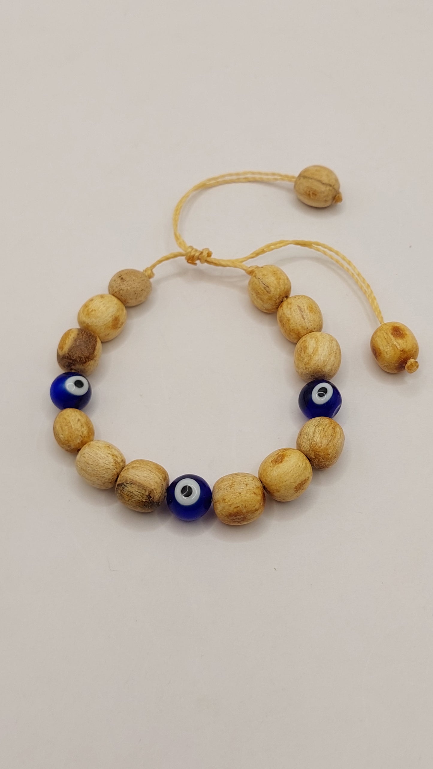 Pulsera de Palo Santo con ojos turcos NATURAL