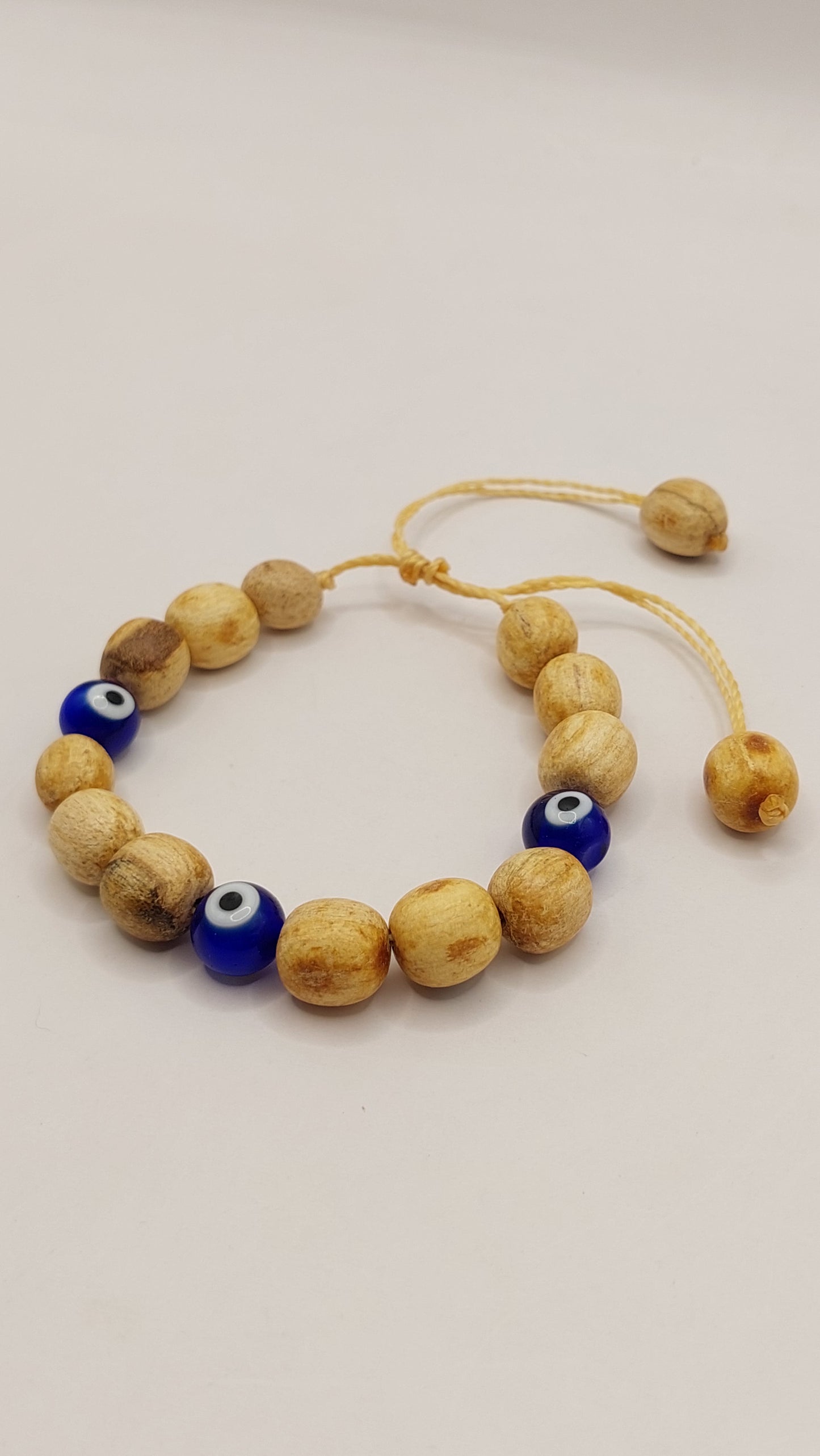 Pulsera de Palo Santo con ojos turcos NATURAL