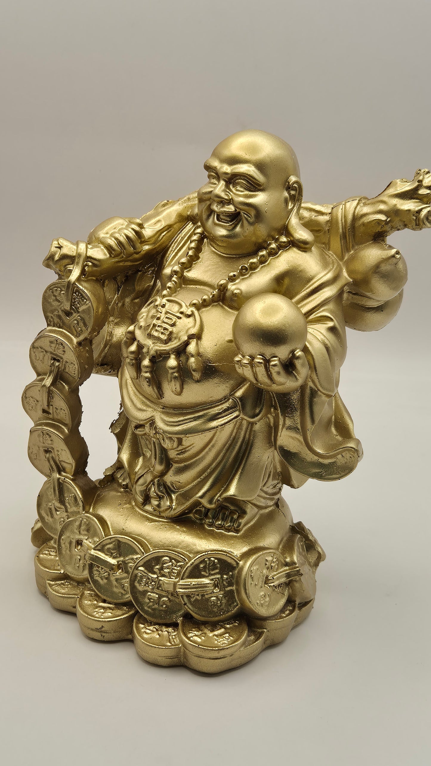 Buda Hotei con monedas (dorado)