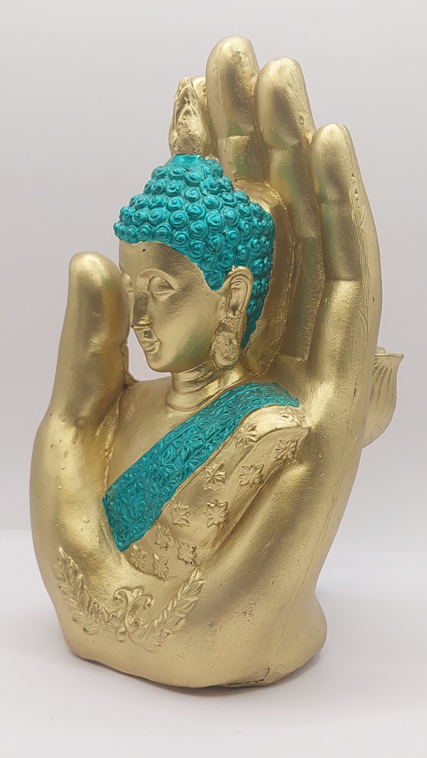 Mano con Buda dorado/verde "Mudra abhaya"