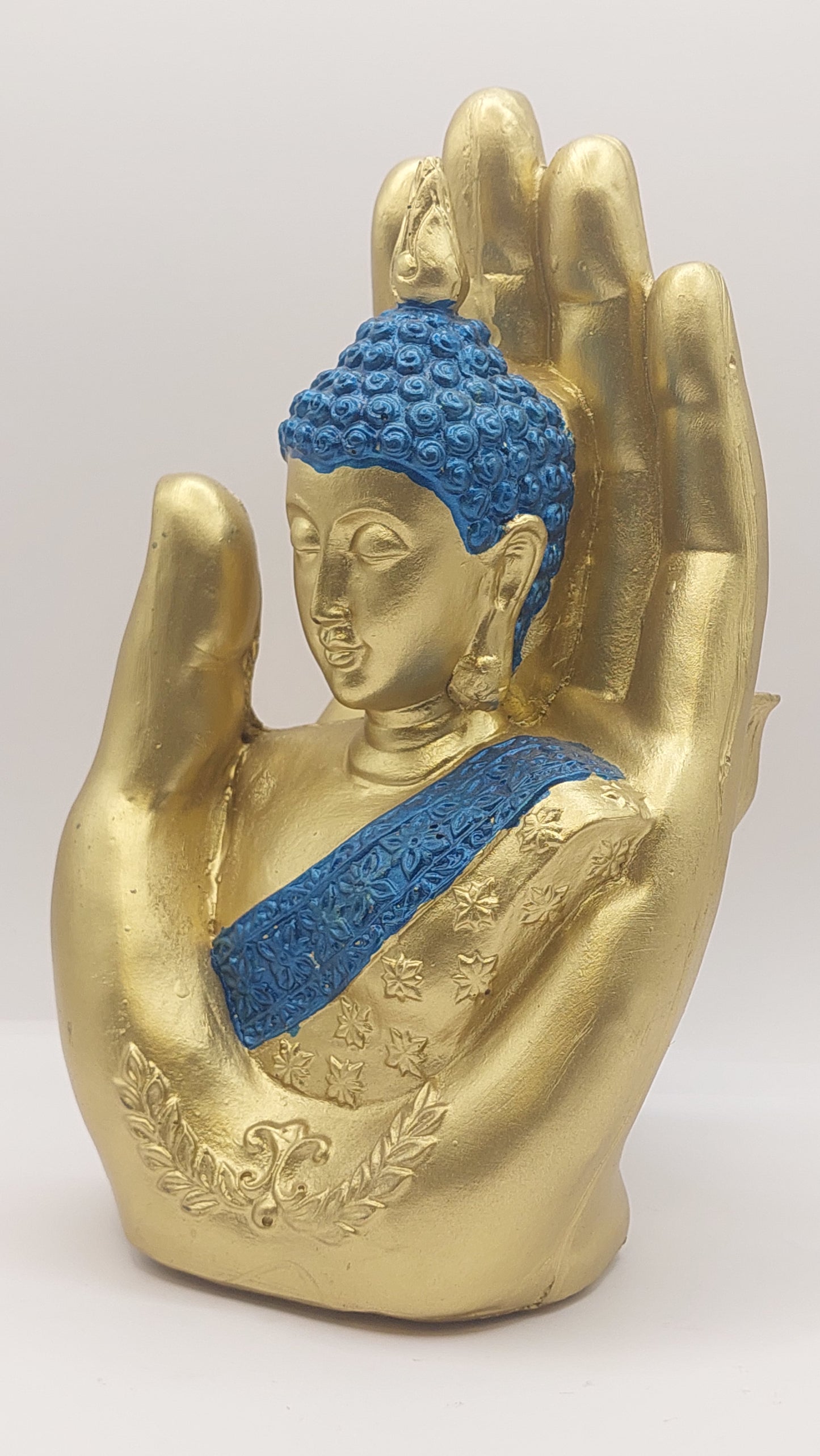 Mano con Buda dorado/azul "Mudra abhaya"